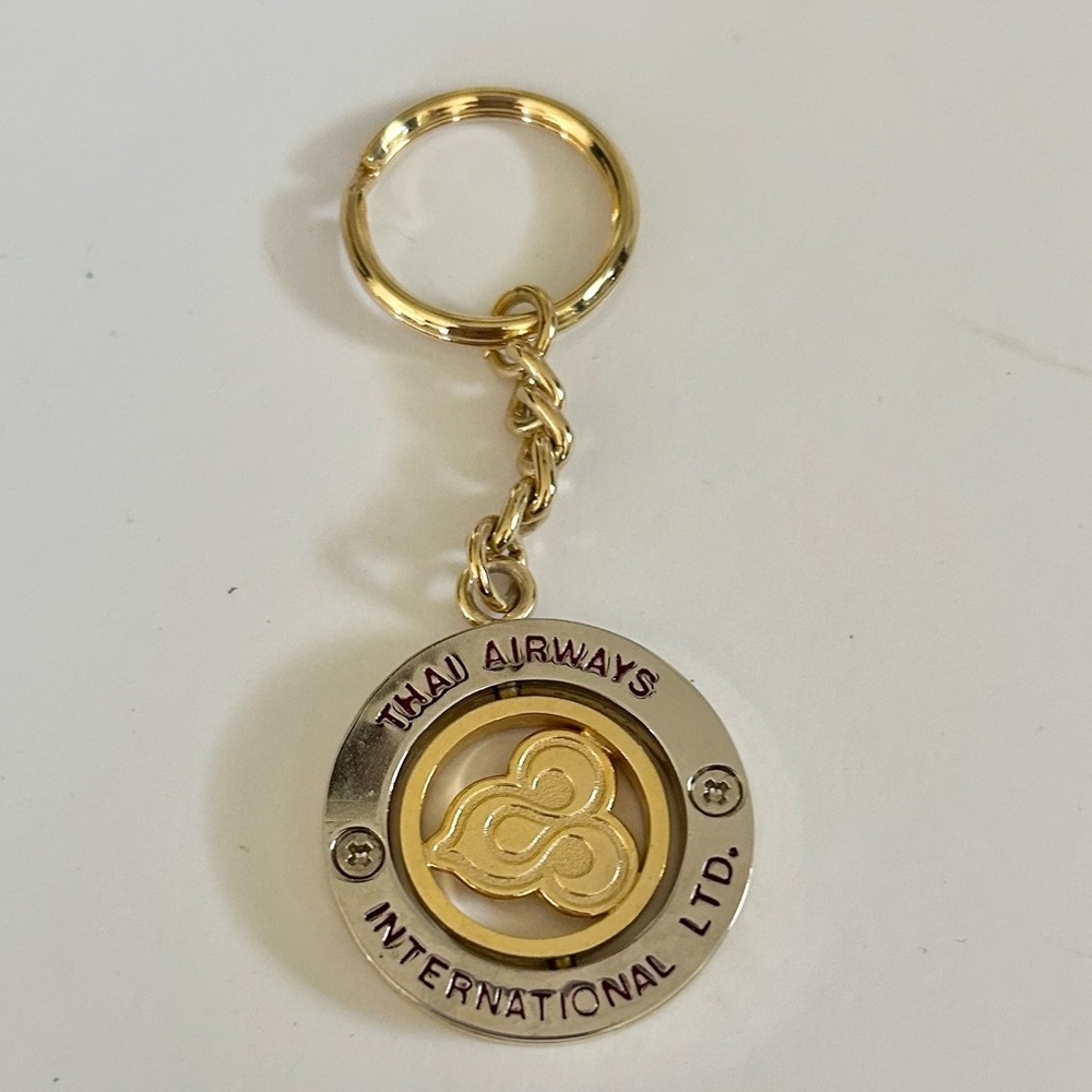 Vintage Thai Airways Spinning Gold & Silver Toned Collectible Keychain